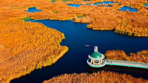  ¿Buscas una experiencia única e inspiradora? ¡El Parque Nacional de la Reserva Natural del Gran Lago salado de Daqing es el destino perfecto para ti!